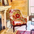 Antiker Sessel mit Blumenmuster